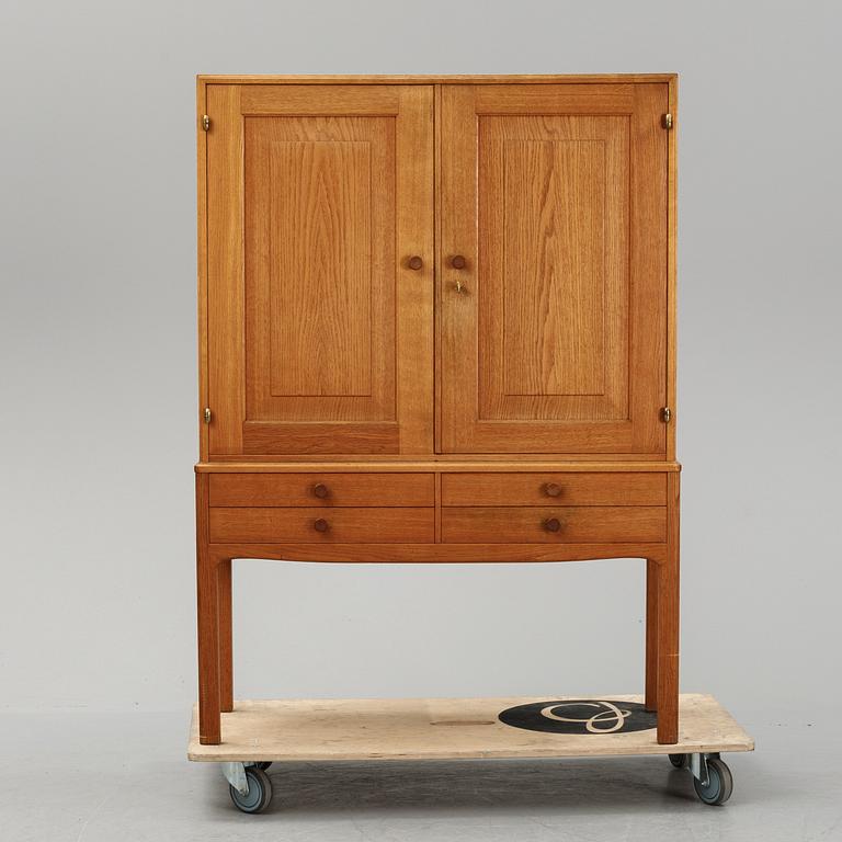 Carl Malmsten, a 'October' cabinet from the second half of the 20th century.