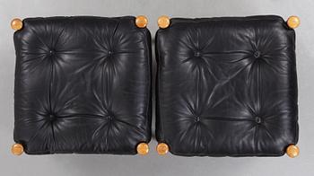 A pair of 'Amiral' easy chair by Eric Merthen.