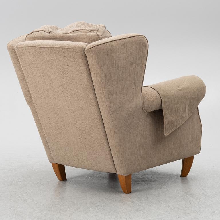 An armchair with footstool, Howard model, Englessons, 21st century.