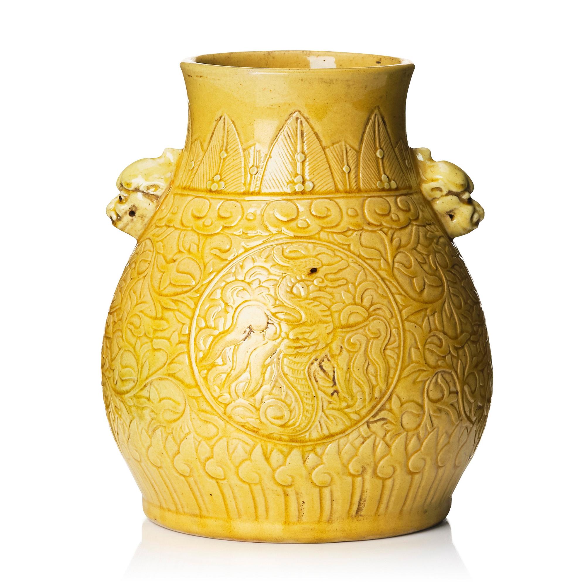 A yellow glazed phoenix vase,  Qing dynasty, with a Kangxi mark.