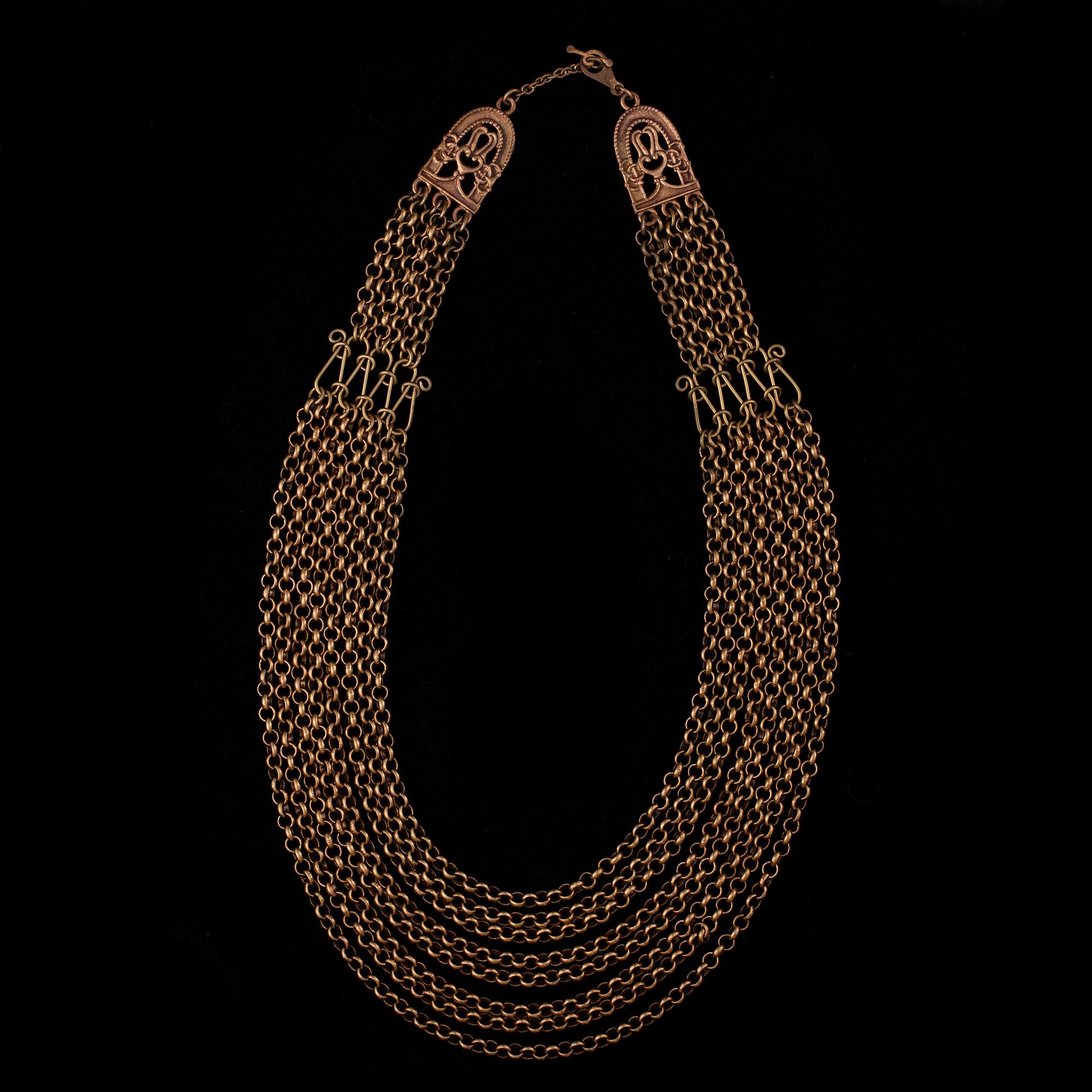 HALSSMYCKE, "Hämäläinen juhlakääty", brons, Kalevala Koru. 1900-tal.