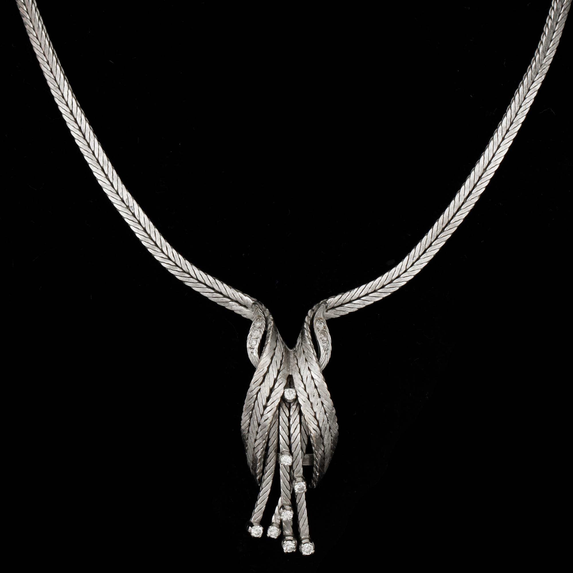 COLLIER, 18k vitguld med briljantslipade diamanter tot ca 0,25 ct. Vikt ca 43 gram.