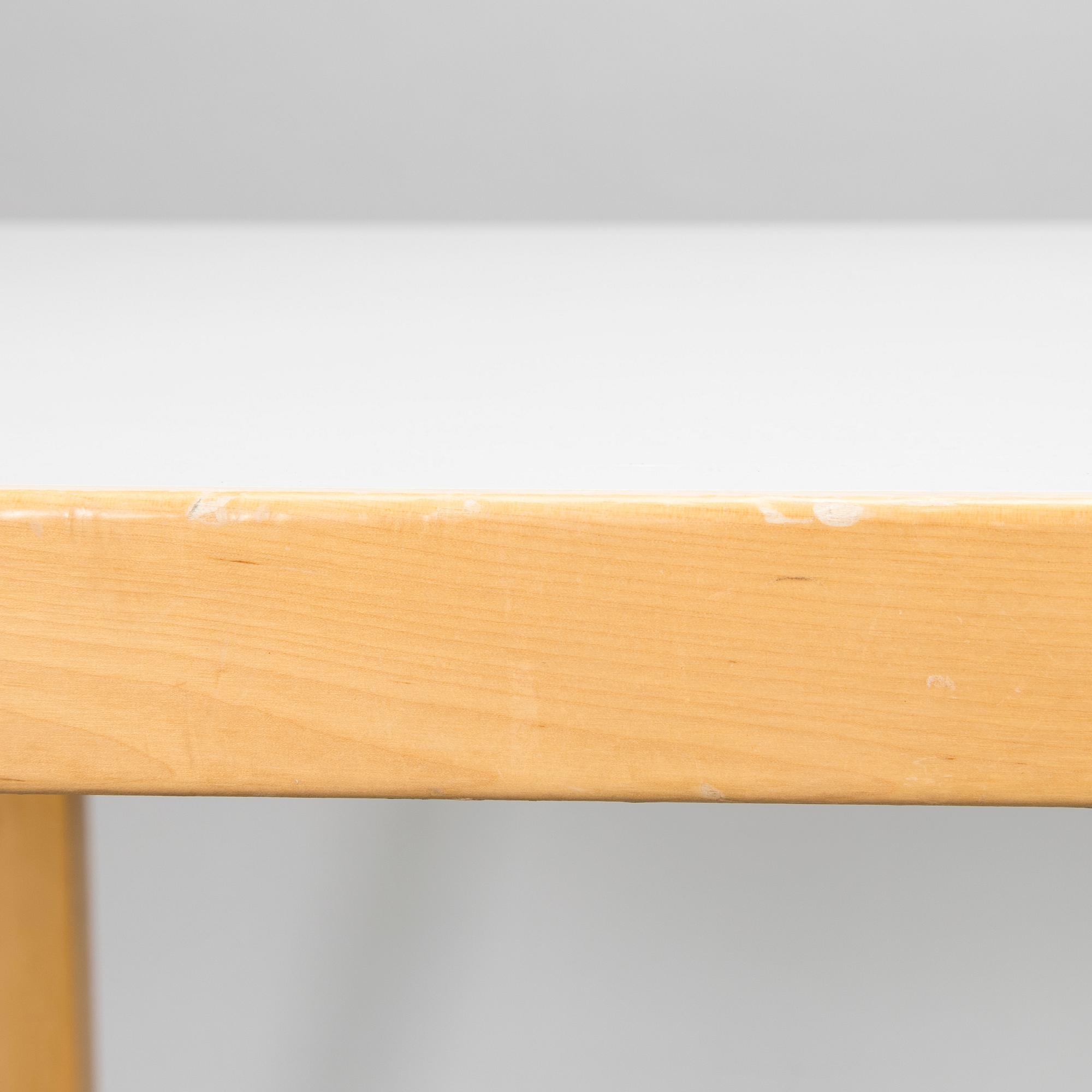 Alvar Aalto, a model 82A Artek table, dated 05/95.
