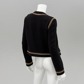 A jacket by Moschino, in size 44 (IT).