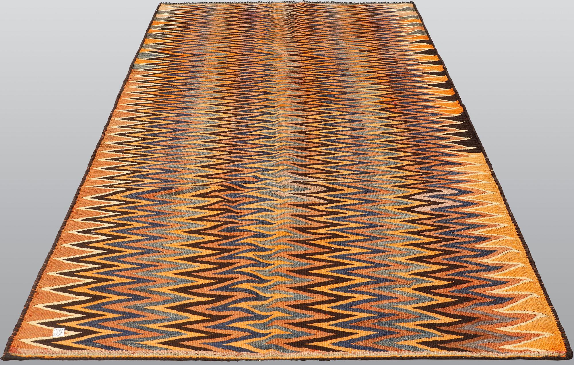 A carpet, Persian Nomad Kilim, ca 267 x 145 cm.