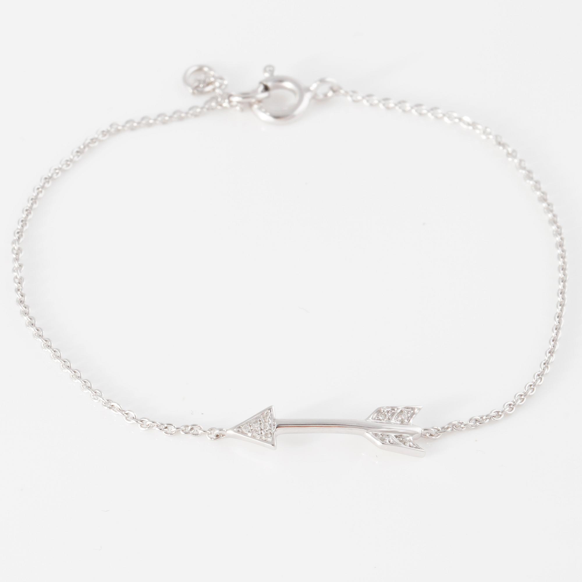 ARMBAND, med 10 briljantslipade diamanter.