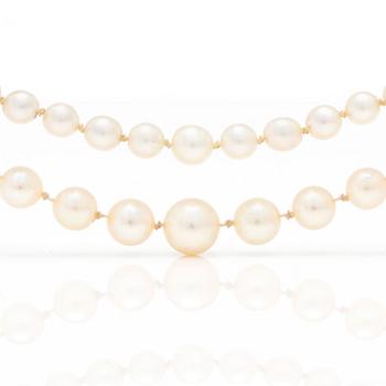 Two necklaces of cultured pearls with silver clasps.