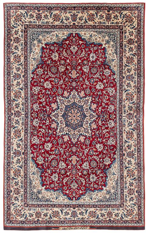 A semi-antique Isfahan rug, Central Persia, signed (Sadegh) Seirafian, c. 237 x 146 cm.