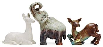 315. Three Gunnar Nylund stoneware figures, two deer and a mammoth, Rörstrand.