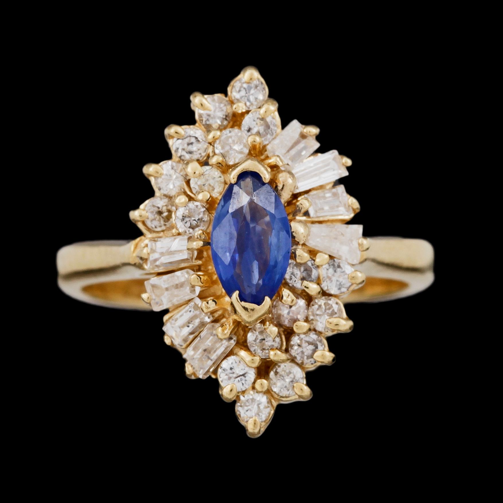 RING, 14k guld med navettslipad safir och diamanter.