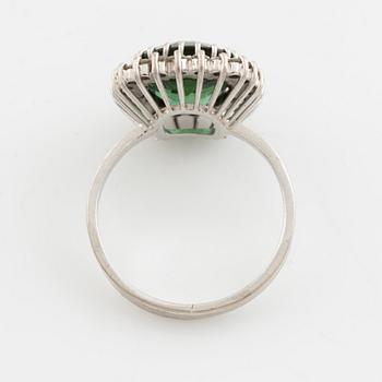 Green tourmaline and eight cut diamond cocktail ring.