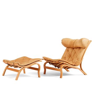 119. Arne Norell, a 'Scandi', easy chair and ottoman, Norell Möbel AB, Sweden 1970s.