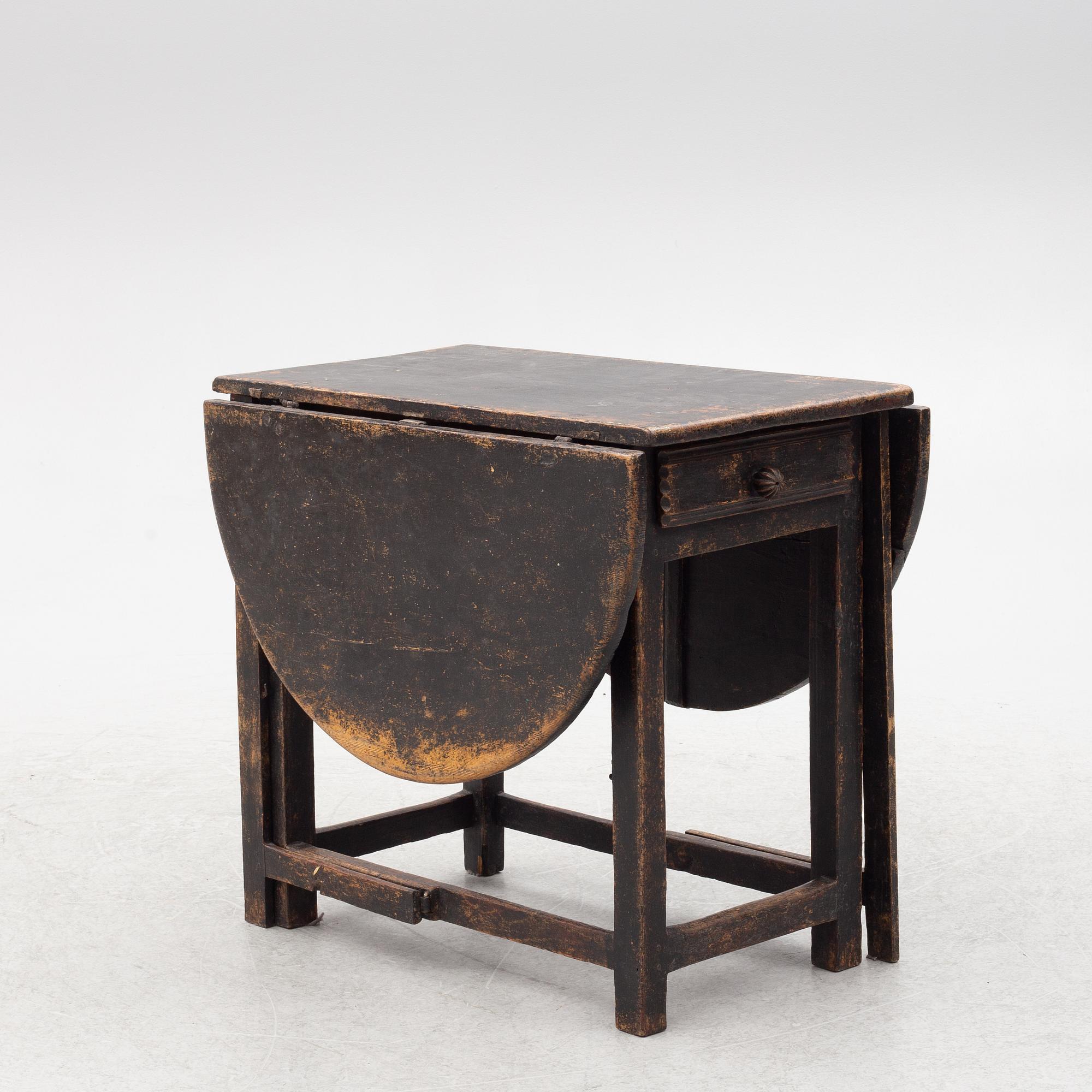 A Swedish wooden table, 19th century.