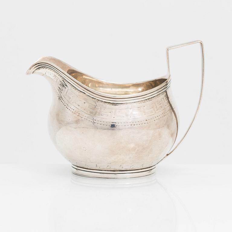 A Georgian sterling silver jug, late 18th century. Worn marks.