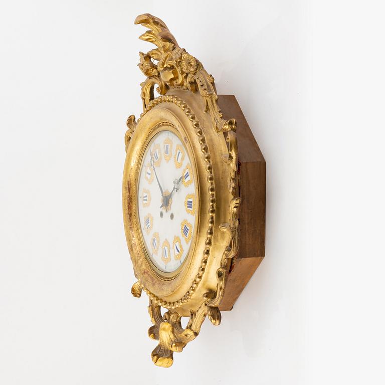 A wall clock, late 19th Century.