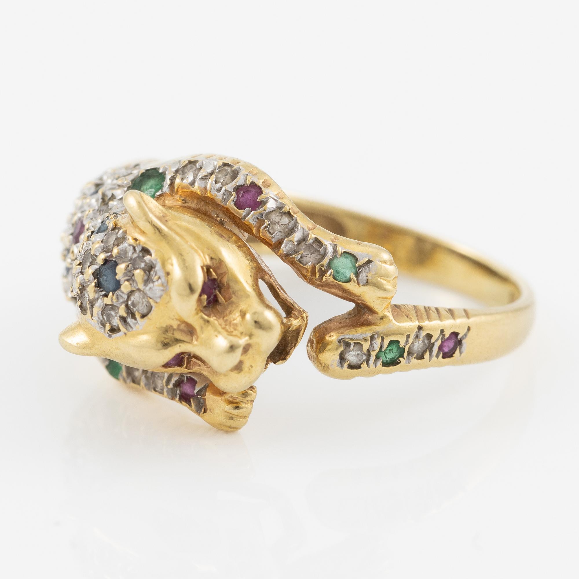 Ring, in the form of a panther, 18K gold with diamonds, sapphires, rubies, and emeralds.