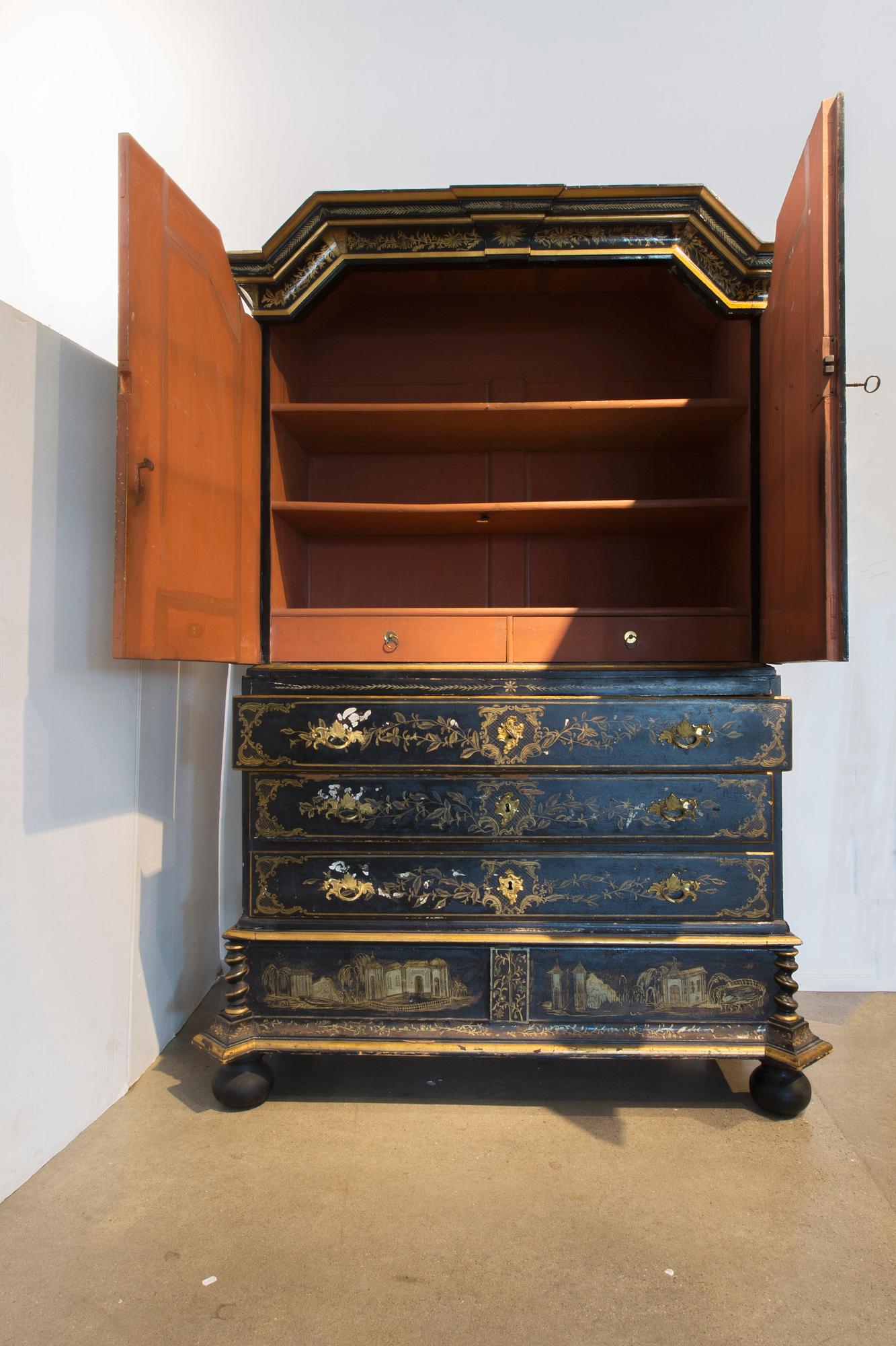 An early 18th century Chinese style cupboard.