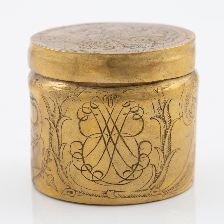 A presumably German baroque brass box, dated 1686.