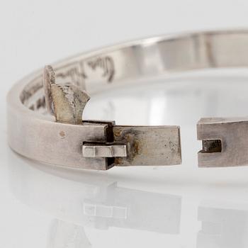 Wiwen Nilsson, a sterling silver bangle with facet cut rock crystal and onyx, Lund, Sweden 1940.