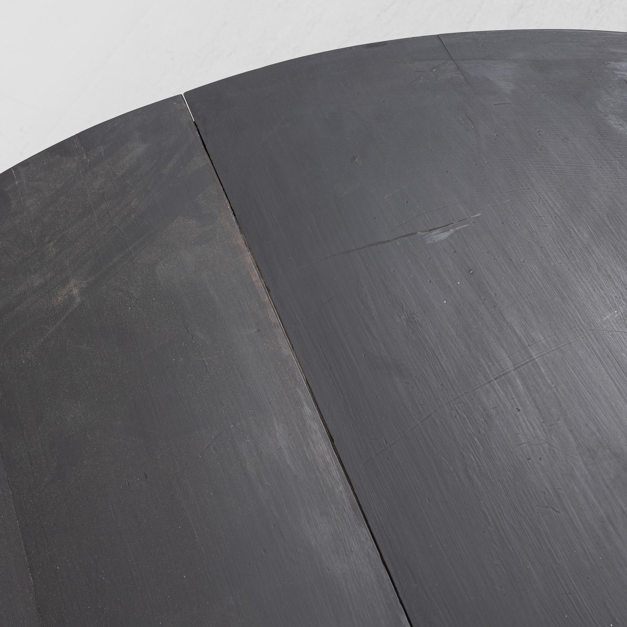 A painted dining table, late 19th Century.