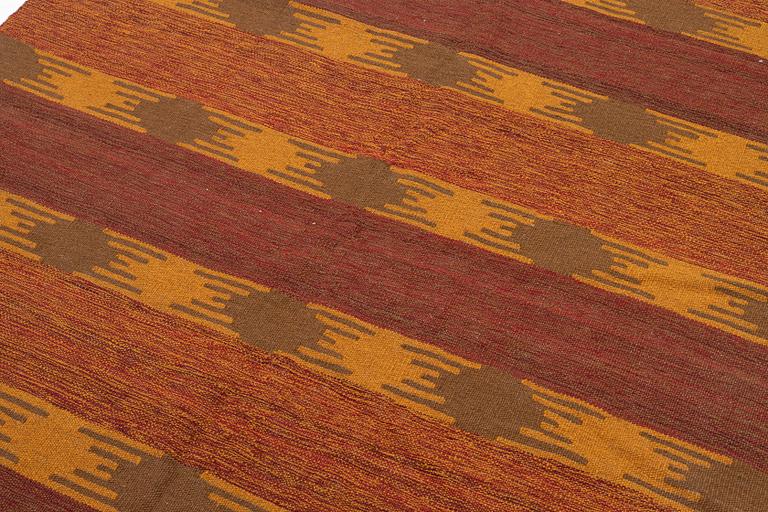 A persian kilim rug, c 196 x 154 cm.