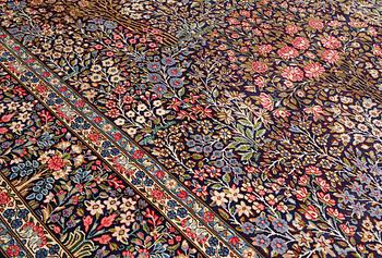 A Kirman Lavar carpet, c. 402 x 297 cm.