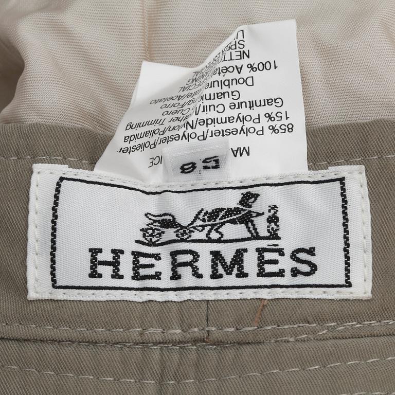HERMÈS, a suede and nylon hat. Size 58.