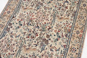 A Nain rug, part silk, figural, c. 165 x 110 cm.