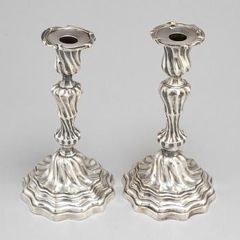 A pair of Louis XV mid 18th century candlesticks.