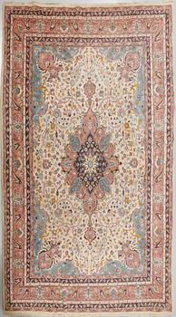 A rug from Smyrna, semi-antique, 417 x 300 cm.