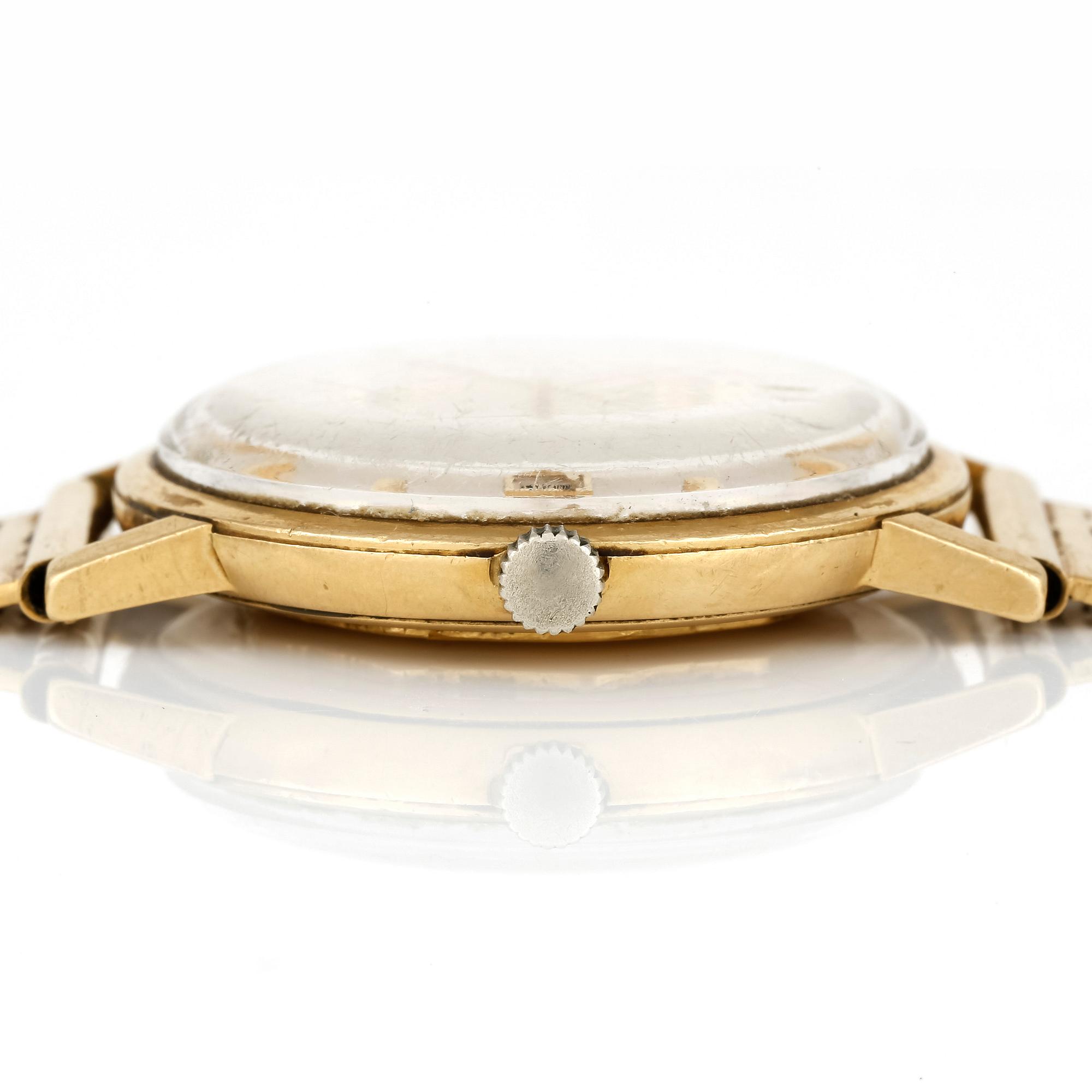 ARMBANDSUR, 18 k guld. Cortebert. Totalvikt ca 75 g.