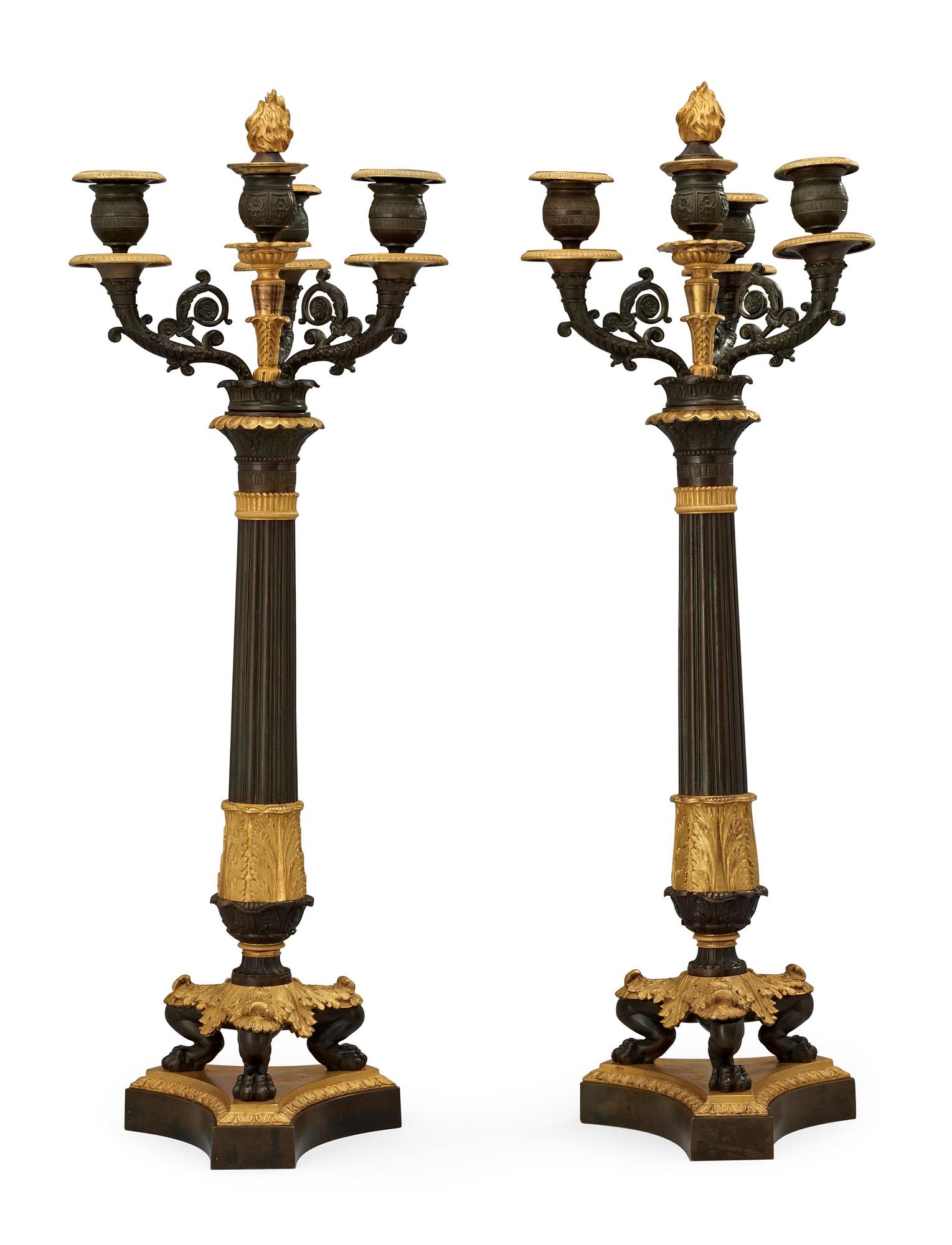 A pair of French Empire 19th century four-light candelabra.