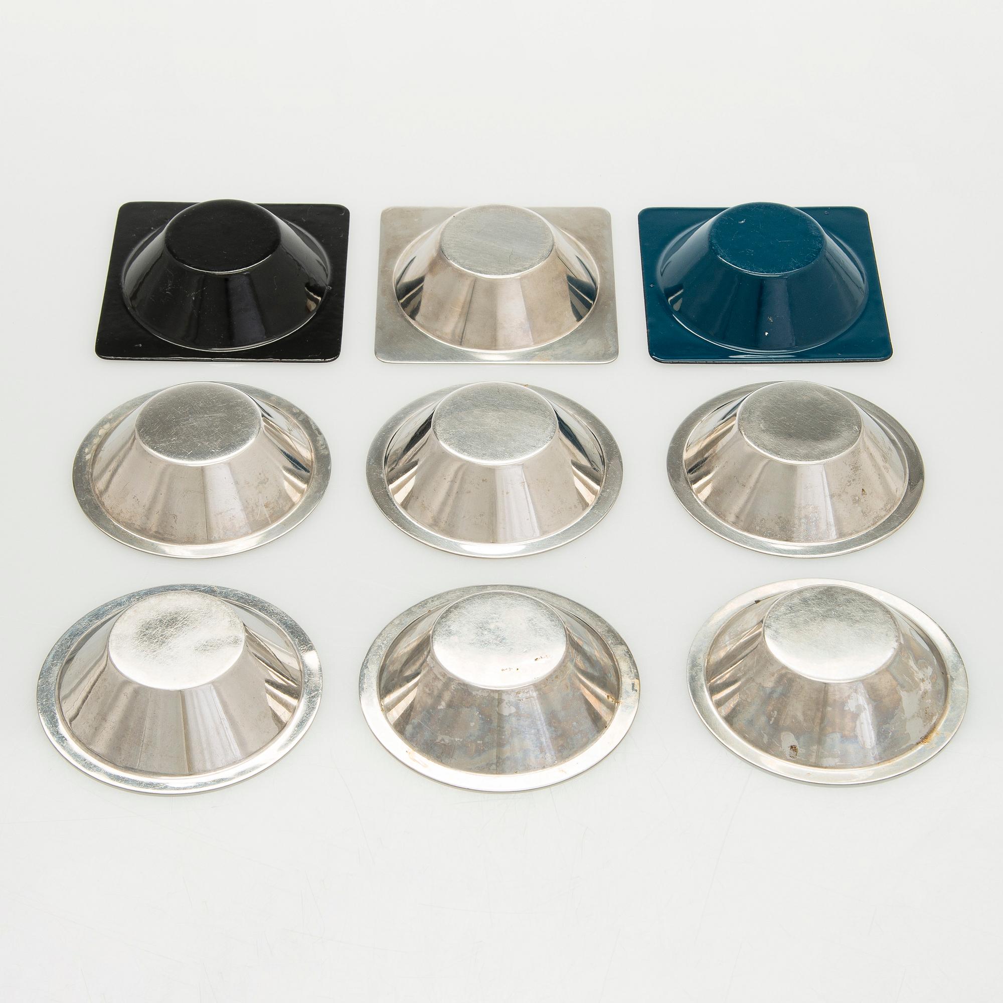 A set of nine mid-20th century metal bowls.
