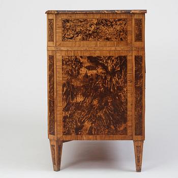 A late Gustavian burr alder-veneered commode, Mälardalen, late 18th century.