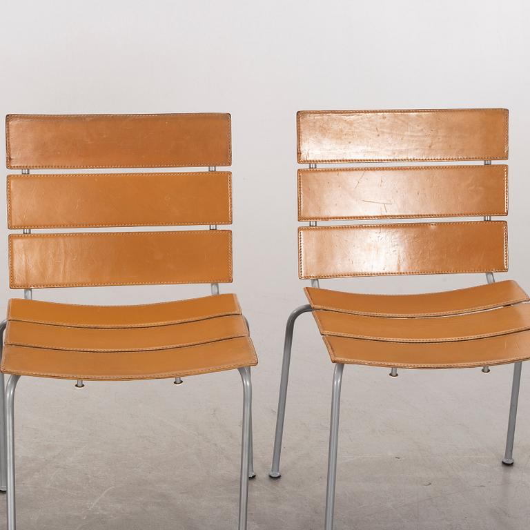 A set of four leather and metall chairs from Fasem, Italy, likely Giancarlo Vegni.