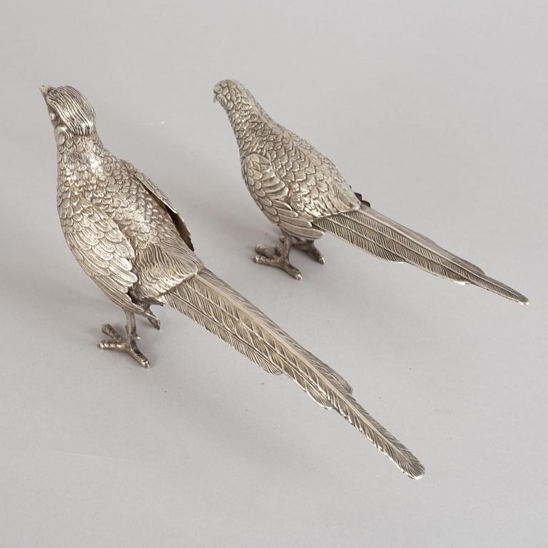 A pair of Spannish 20th century silver pheasants.