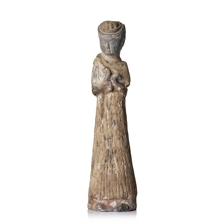 A pottery figure of a lady, Han dynasty (220 BC-206 AD).