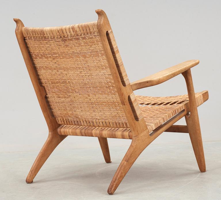 A Hans J Wegner 'CH-27' oak and rattan armchair, Carl Hansen & Son, Denmark 1950's-60's.