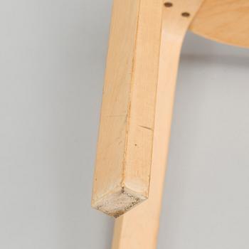 Alvar Aalto, A mid-20th century drop leaf table and three chairs for O.Y. Huonekalu-ja Rakennustyötehdas A.B.