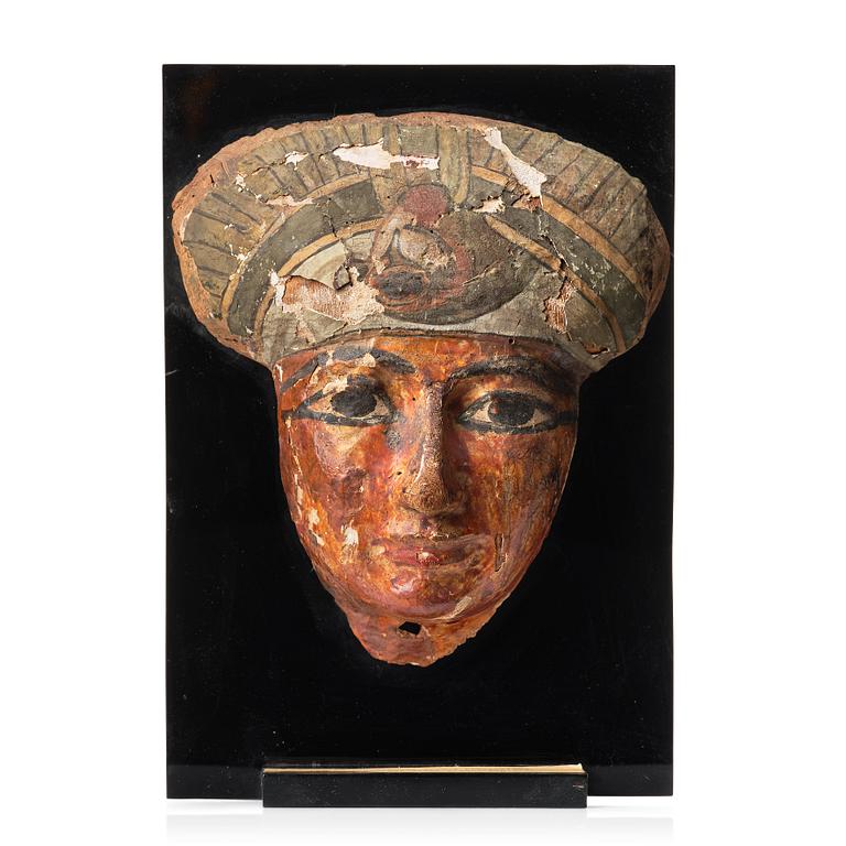 An Egyptian sarcophagus mask, ca 800-500 B.C.