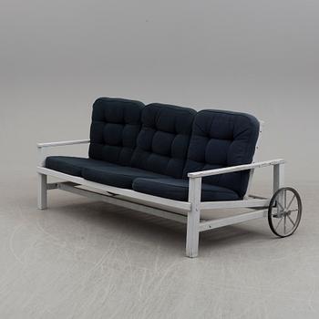 A garden sofa by Elsa Stackelberg, Fri Form, Edsbruk.