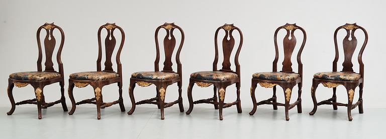 A set of 12 rococostyle chairs, 20 th century.