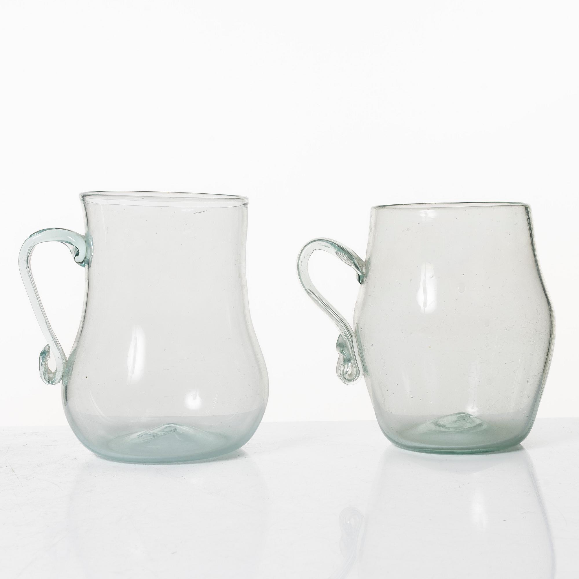 A set of two Swedish glass tankards, early 19th century.