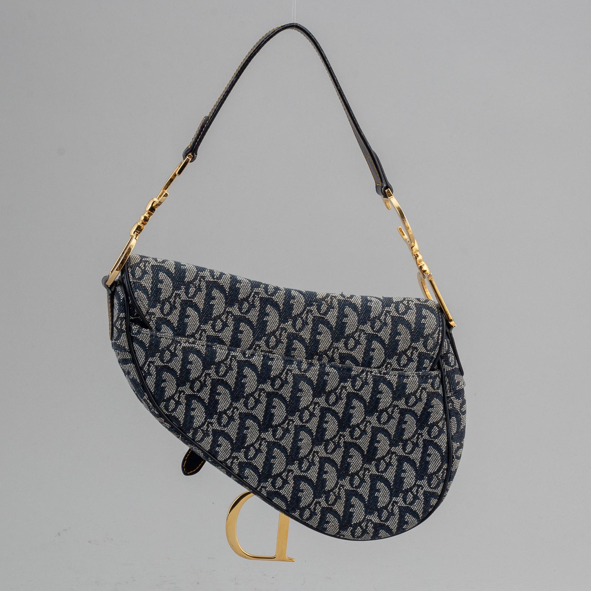 CHRISTIAN DIOR, a vintage mpnpgram canvas 'Saddle Bag!.