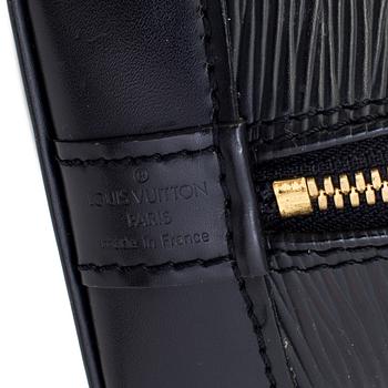 A black epi "Alma" handbag and keyholder by Louis Vuitton.