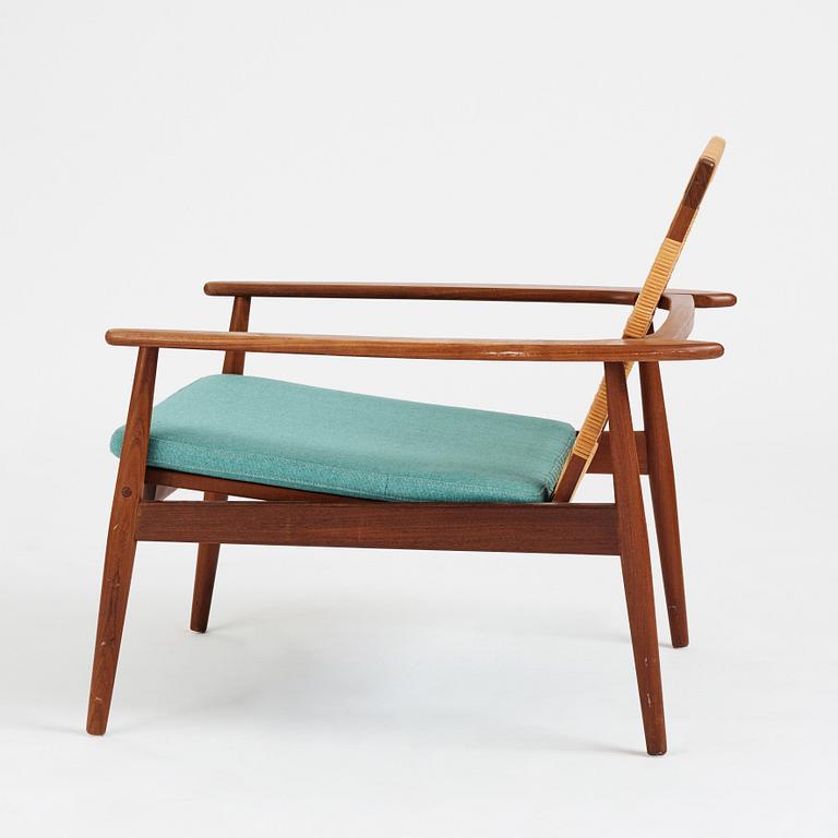 Hans Olsen, a model 519 teak easy chair for Juul Kristensen, Denmark, 1950's.