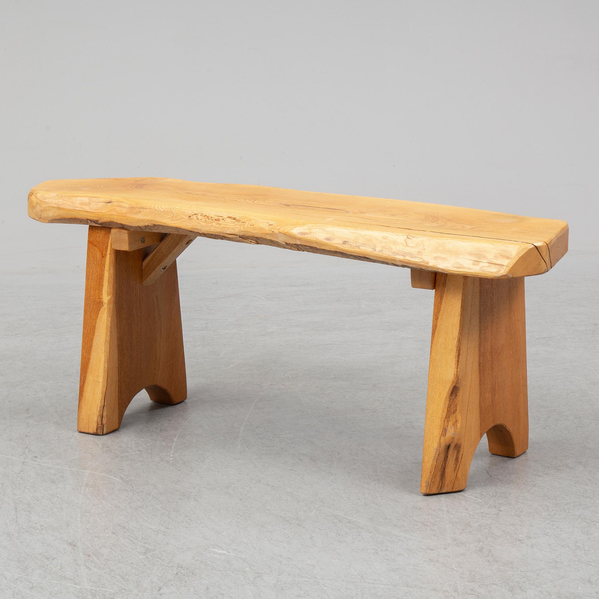 A second half of the 20th Century pine bench.