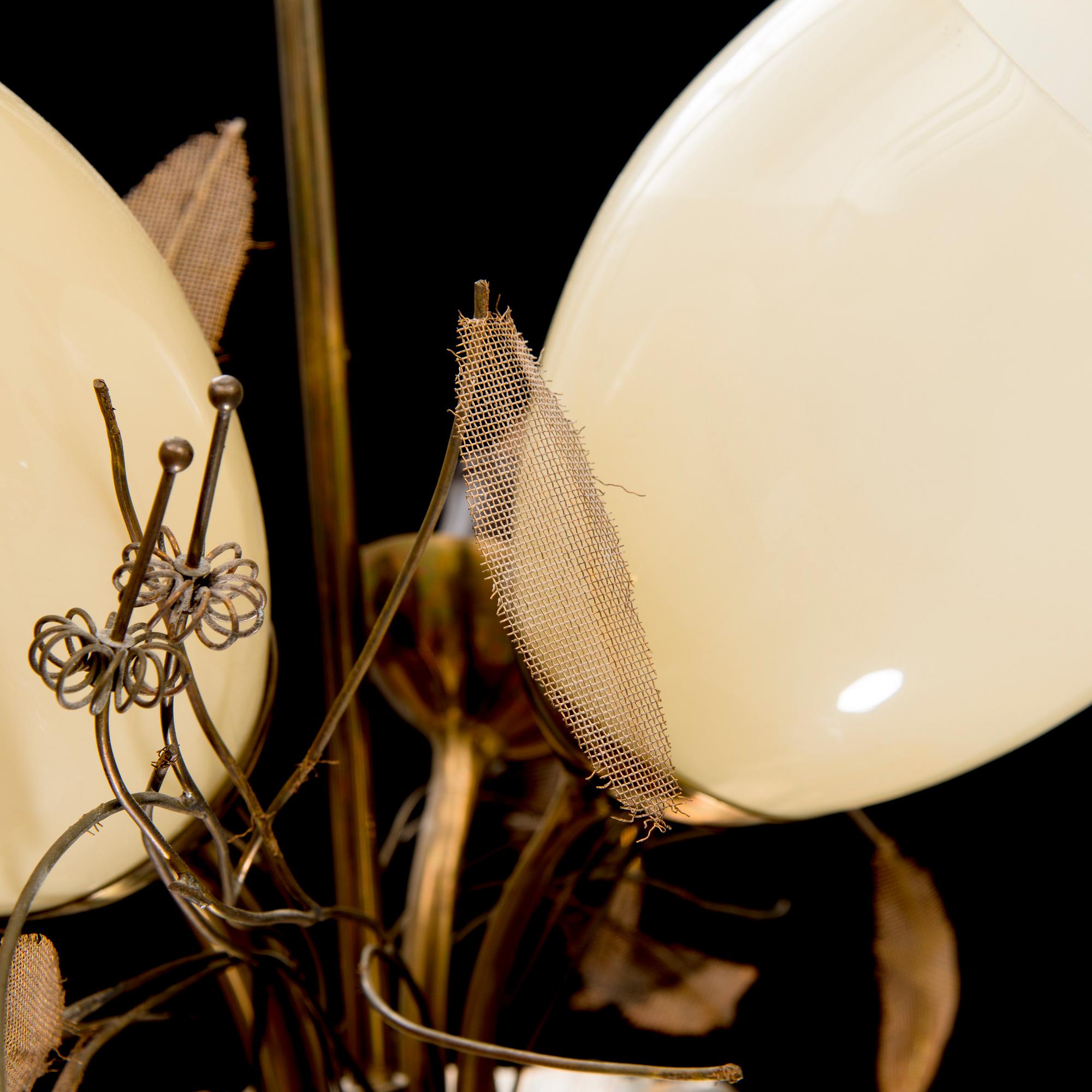 A mid 20th Century model 9029/4 chandelier for Taito Oy, Finland.