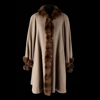 568. A 1980s fur-trimmed beige silk and wool cape by Louis Féraud.
