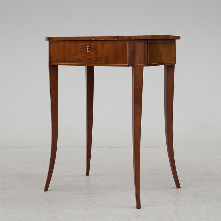 A second half of the 19th century mahogany veneered table.